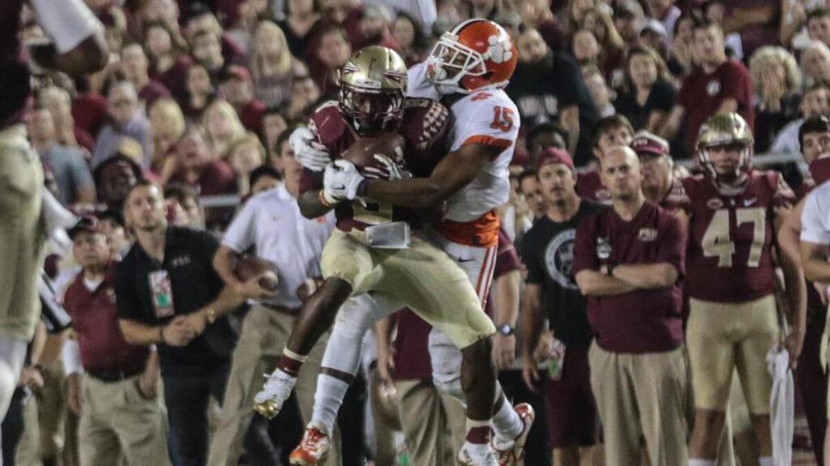 Clemson's Safety Korrin Wiggins makes a tackle when the Tigers took on the Florida State Seminoles.