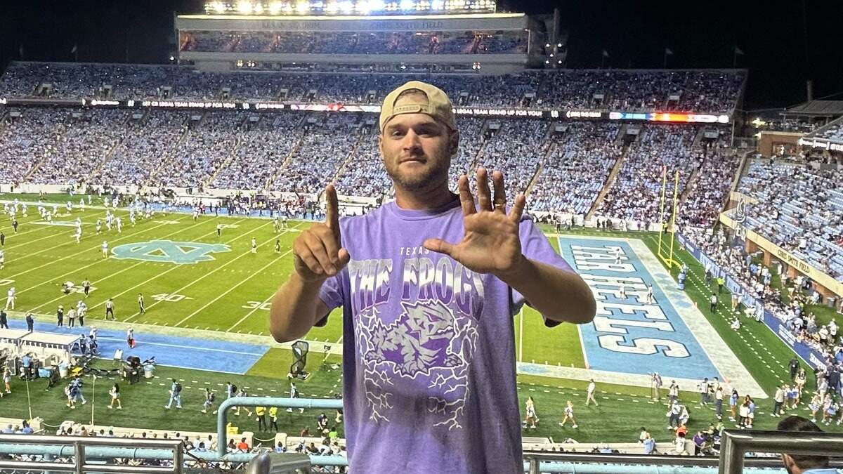 South Carolina native Hunter King celebrates after attending his sixth college football game in five days on Monday, Sept. 1 during the UNC-TCU game in Chapel Hill.