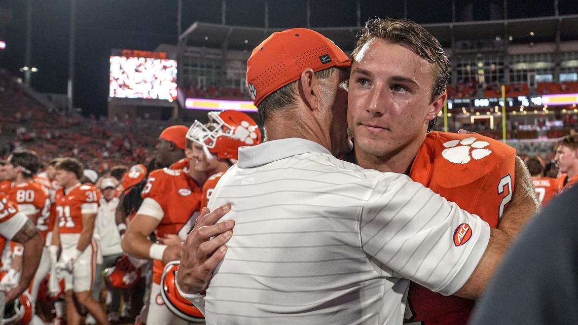 Clemson head coach Dabo Swinney hugs quarterback Cade Klubnik (2) after the game with Troy at Memorial Stadium Saturday, September 6, 2025 in Clemson, S.C.
