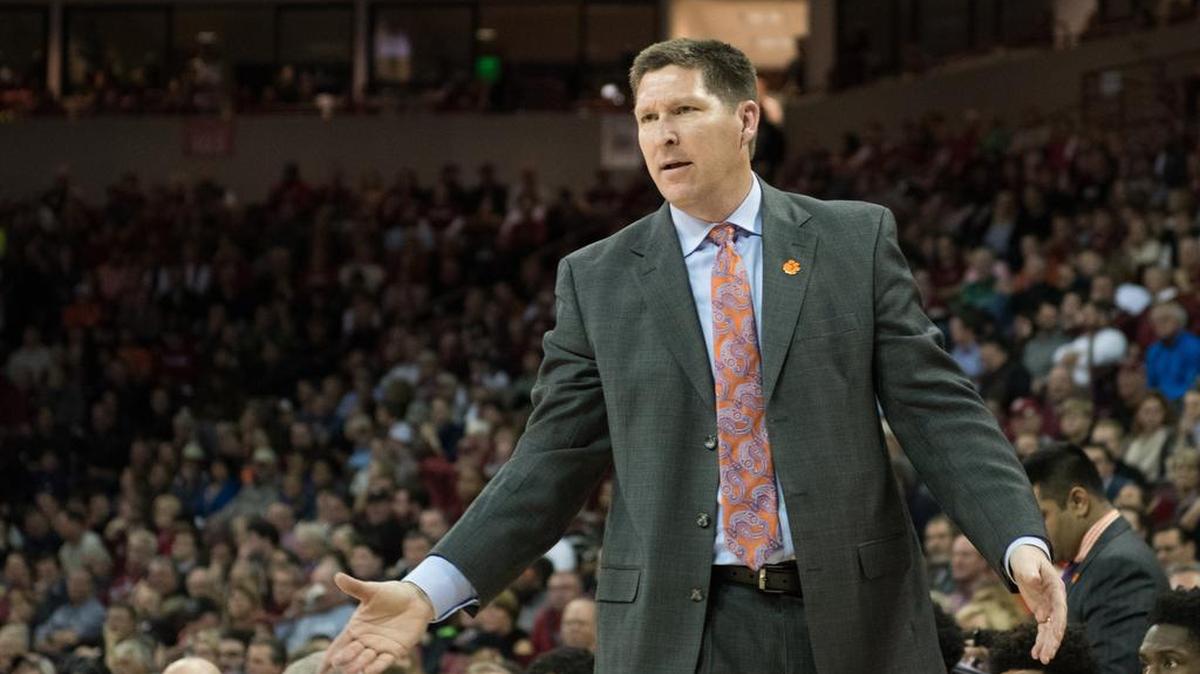 Clemson coach Brad Brownell signals to his players on the court after a foul during their game against USC.