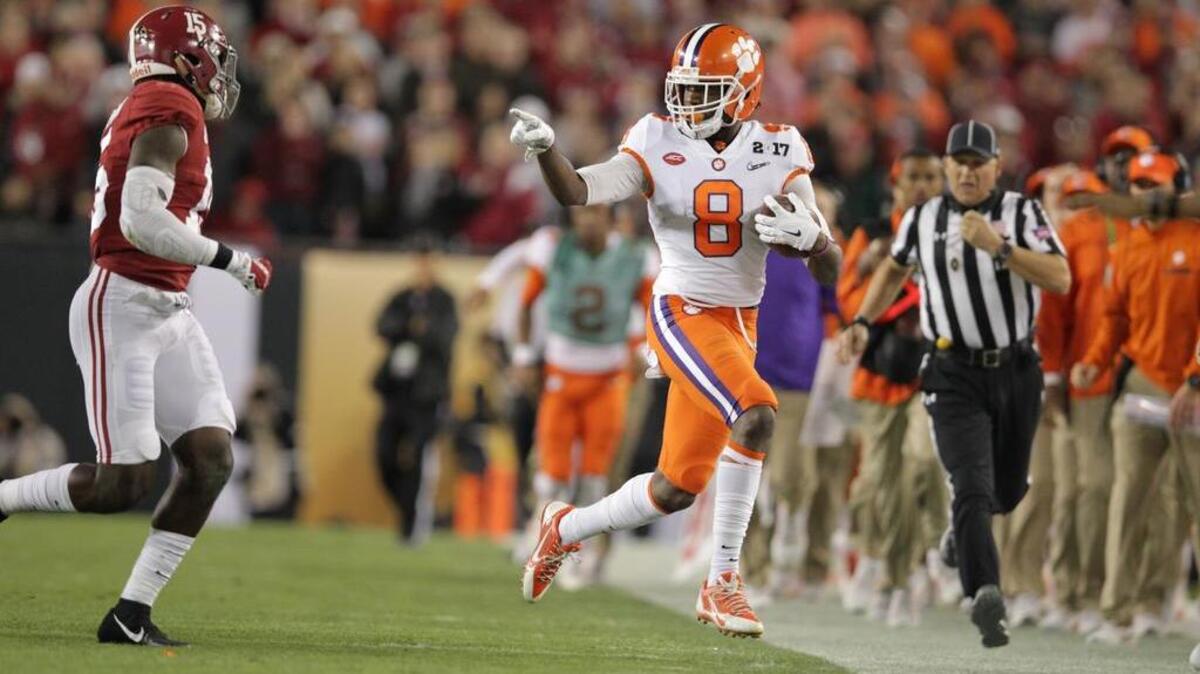 Clemson Tigers wide receiver Deon Cain (8) breaks free for a big gain in the first half of the National Championship game at Raymond James Stadium in Tampa.