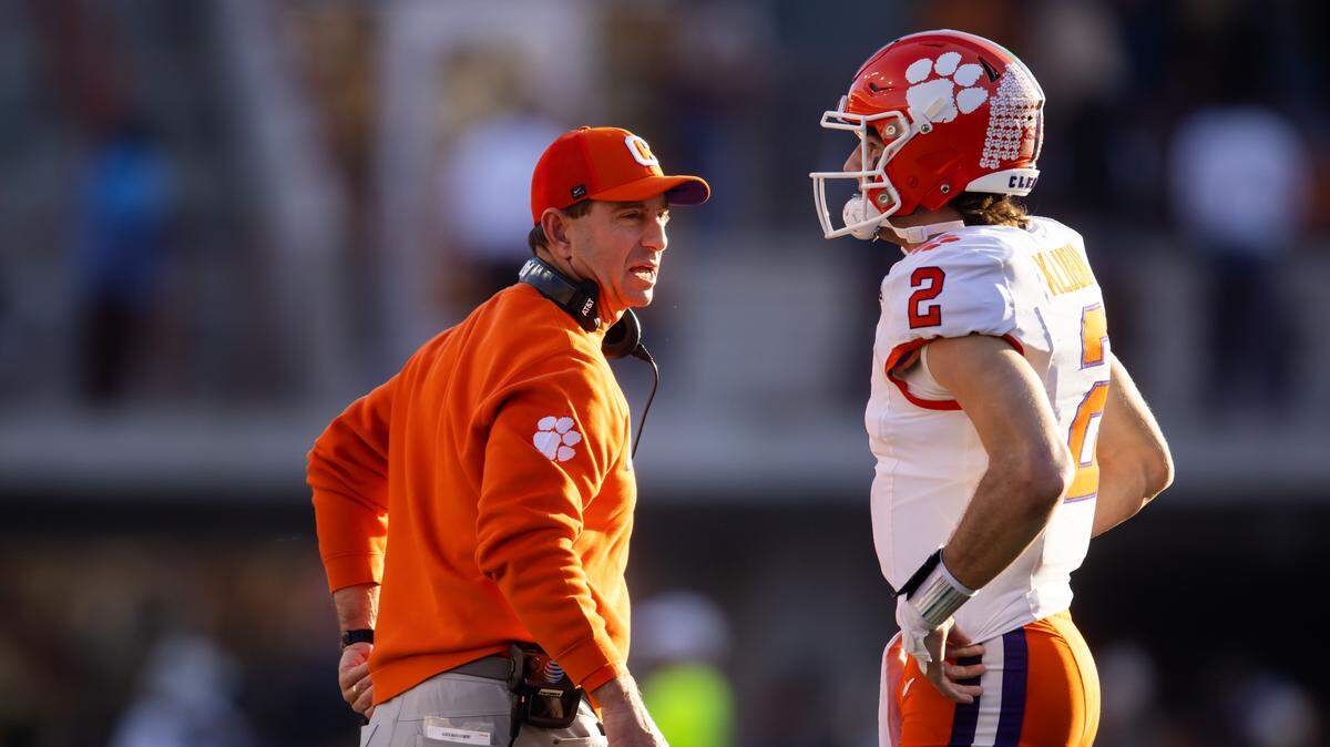 Clemson football coach Dabo Swinney (left) and starting quarterback Cade Klubnik (right)