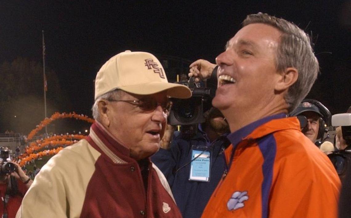 From 2003: Florida State head coach Bobby Bowden shakes the hand of his son and Clemson head coach Tommy Bowden before the Tigers take on the Seminoles in Clemson.