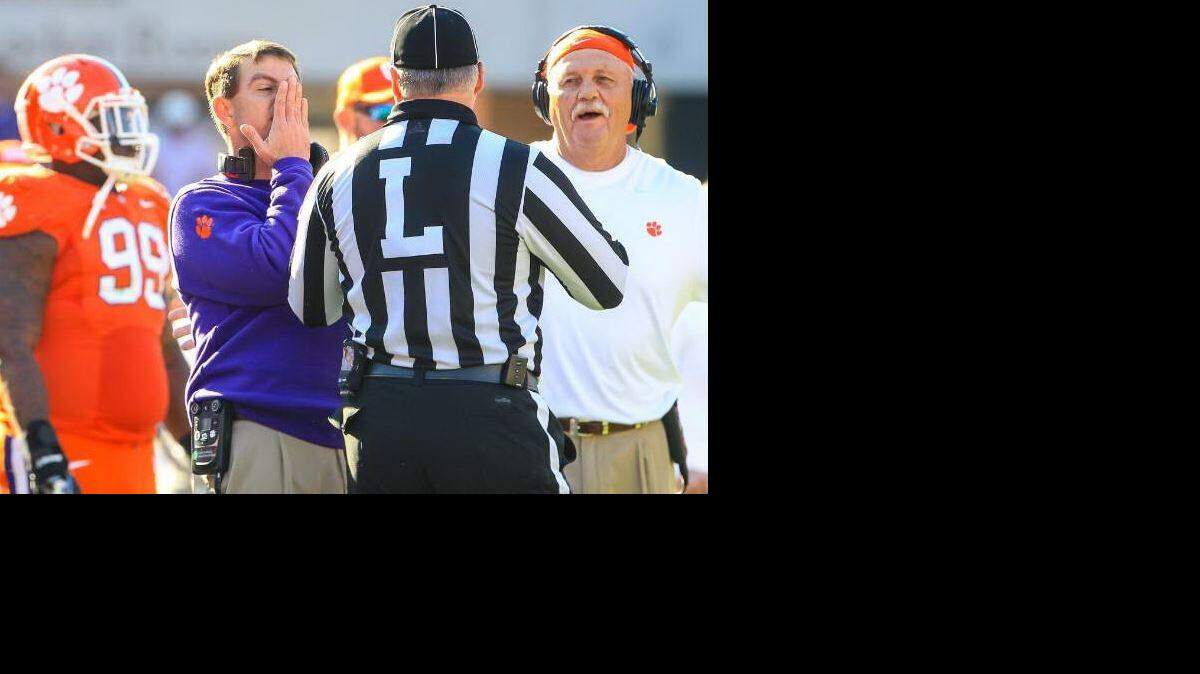 
Clemson head coach Dabo Swinney argues a personal foul call during the second half of the 2014 South Carolina-Clemson football game in Memorial Stadium. Swinney and Alabama coach Nick Saban are among the head coaches protesting “satellite camps” run by Northern schools trying to gain a recruiting foothold in Southern states.
