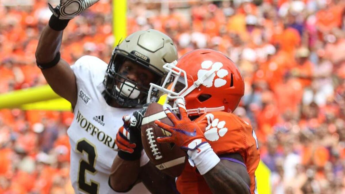 Wofford's Chris Armfield tries to make a play on Ray-Ray McCloud.