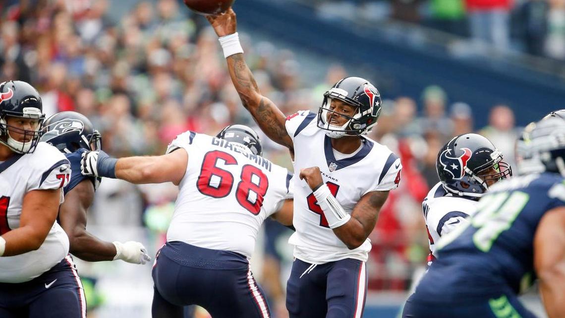 Houston Texans quarterback Deshaun Watson (4) passes against the Seattle Seahawks during the first quarter at CenturyLink Field.