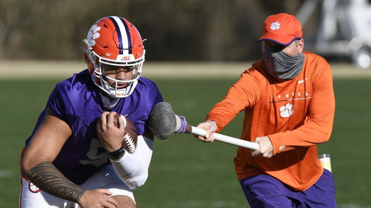 Clemson offensive coordinator and quarterbacks coach Brandon Streeter works with quarterback DJ Uiagalelei (5) during the Tiger’s spring practice Friday, March 5, 2021. Bart Boatwright/Special to The State