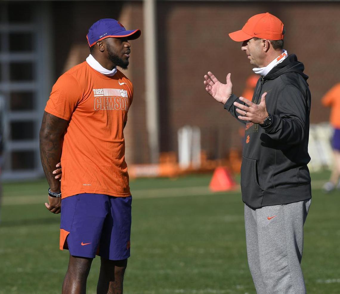 Clemson head coach Dabo Swinney talks with graduate assistant Artavis Scott during the Tiger’s spring practice Friday, March 5, 2021. Bart Boatwright/Special to The State
