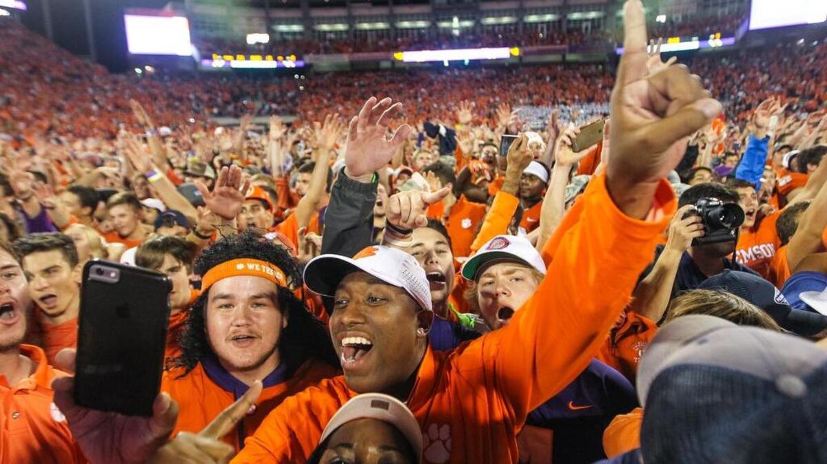 Clemson fans stormed the field to celebrate the Tigers winning their division in the ACC by beating Florida State Saturday at Death Valley.