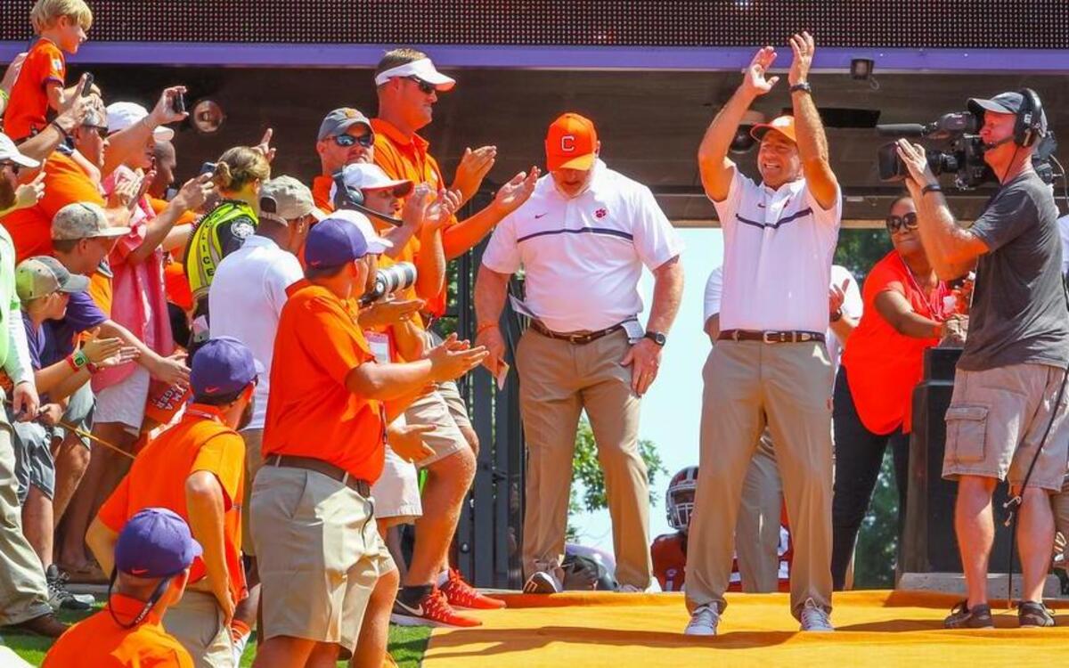 Clemson head coach Dabo Swinney gets the fans fired up at Memorial Stadium.