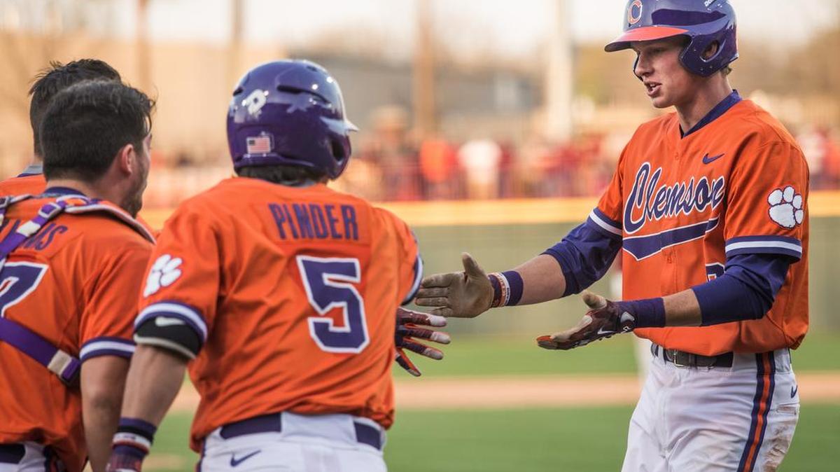 Clemson shortstop Logan Davidson celebrates with teammates.