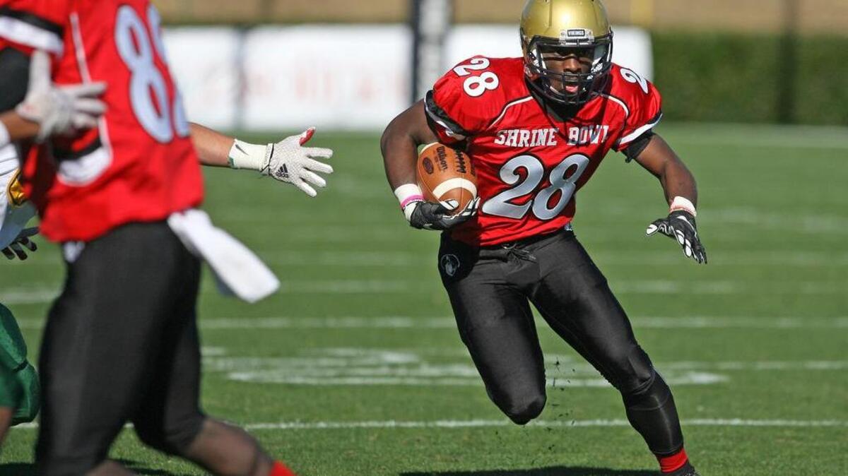 Spartanburg running back and Clemson commit Tavien Feaster had 14 carries for 55 yards and a touchdown for the SC Sandlappers team during the Shrine Bowl on Saturday at Wofford's Gibbs Stadium in Spartanburg.