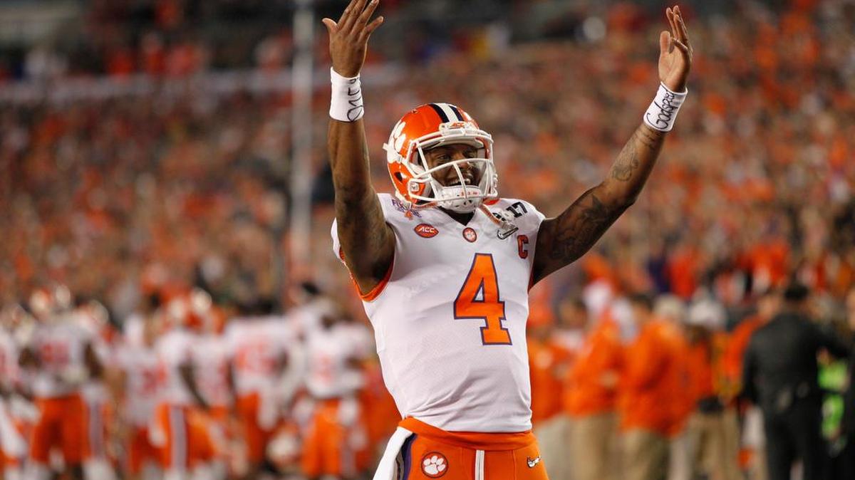 Clemson Tigers quarterback Deshaun Watson (4) gets the crowd pumped at the National Championship game against Alabama.