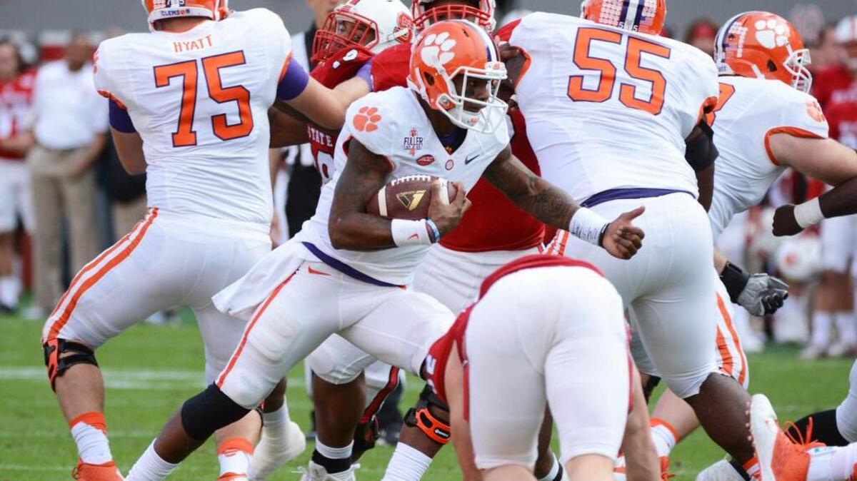 Clemson quarterback Deshaun Watson (4) runs the ball North Carolina State.