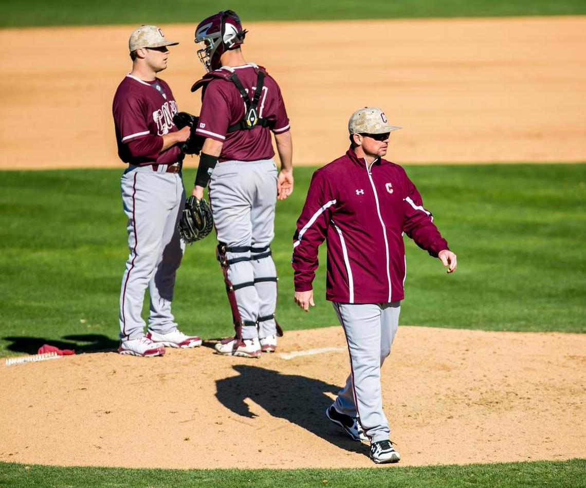 College of Charleston head coach Monte Lee leaves the mound after a pitching change in a game between the South Carolina Gamecocks and the College of Charleston Cougars.