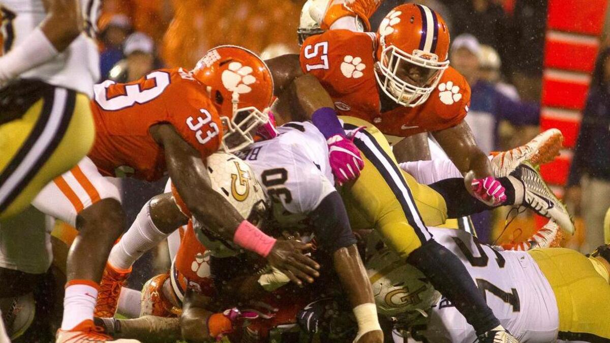 Clemson linebacker Tre Lamar (57) led the Tigers with 11 tackles against Georgia Tech.