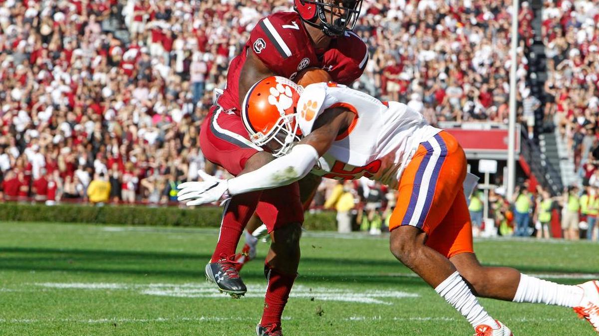 Clemson cornerback Cordrea Tankersley tackles South Carolina’s Shon Carson during a game earlier this season. Tankersley leads Clemson with five interceptions.