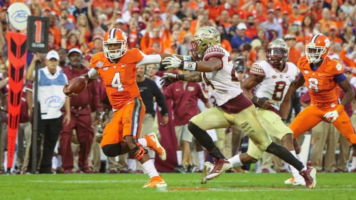 Clemsons quarterback Deshaun Watson (4) has added an extra element on the ground.