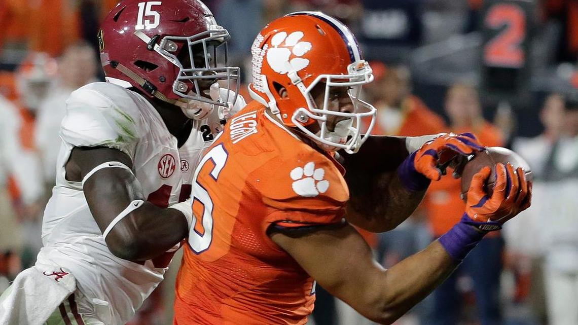 FILE - In this Jan. 11, 2016, file photo, Clemson's Jordan Leggett, right, catches a touchdown pass in front of Alabama's Ronnie Harrison during the second half of the NCAA college football playoff championship game, in Glendale, Ariz. Leggett had 40 catches and eight touchdowns last season. (AP Photo/Chris Carlson, File)