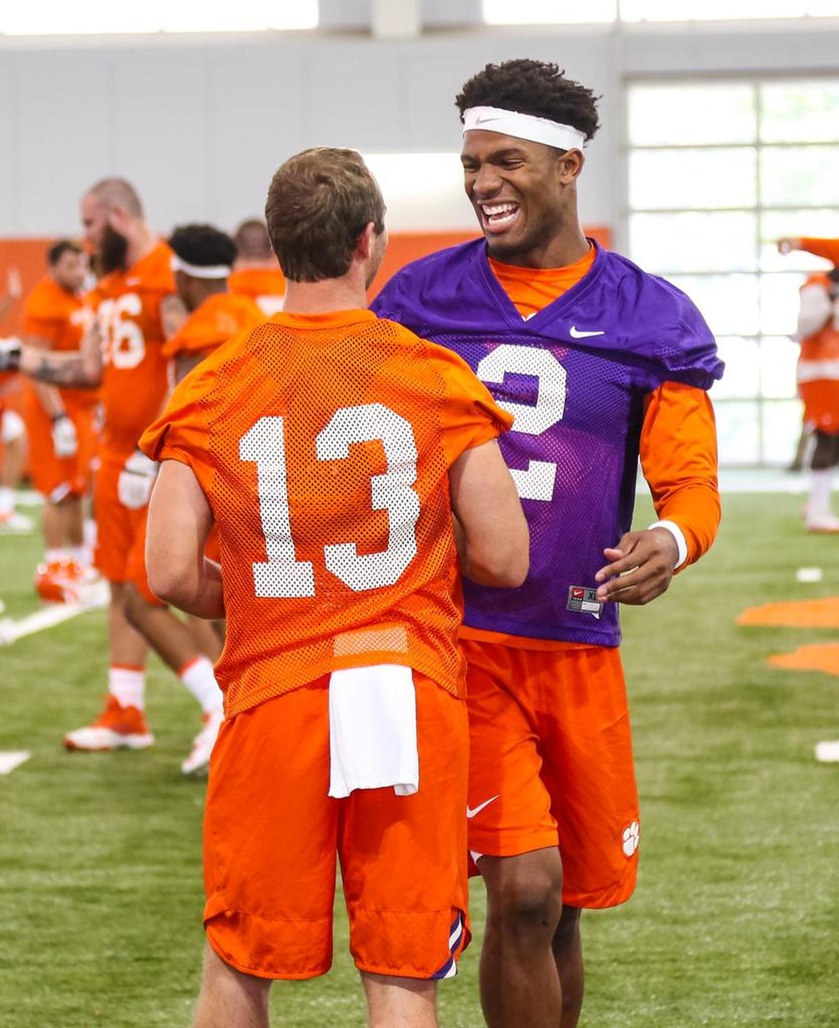 Clemson quarterback Kelly Bryant (2) talks with Clemson wide receiver Hunter Renfrow (13) at practice.