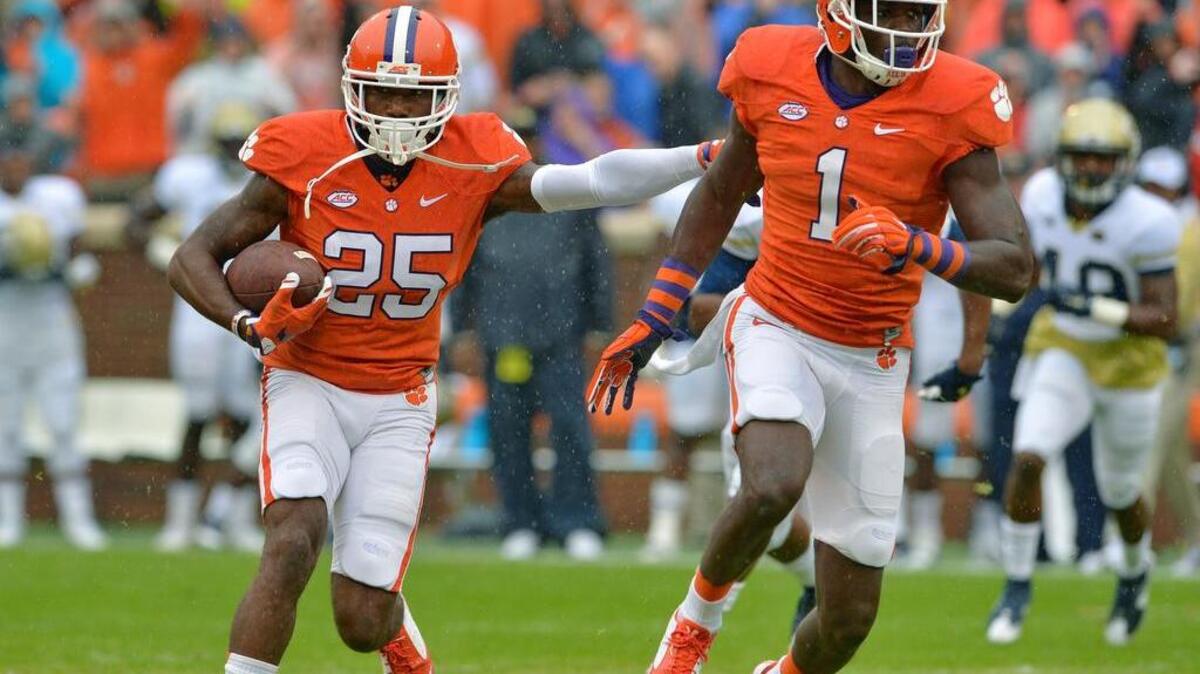 
Clemson’s Cordrea Tankersley (25) gets blocking help from Jayron Kearse while running back an interception during the first half of an NCAA college football game against Georgia Tech Saturday, Oct. 10, 2015, in Clemson
