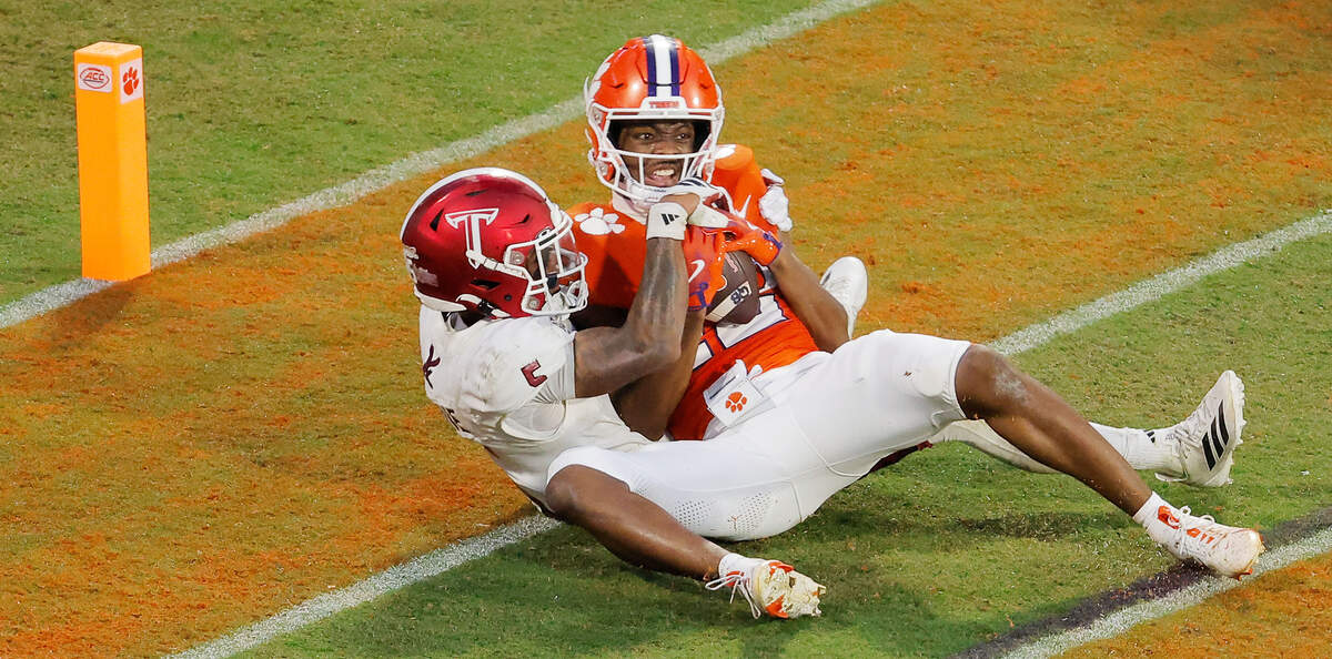 Clemson wide receiver Bryant Wesco Jr. (12) hangs on to a touchdown catch over Troy cornerback Kaleno Levine (5) during second-half action in Clemson, S.C on Saturday, Sept. 6, 2025.
