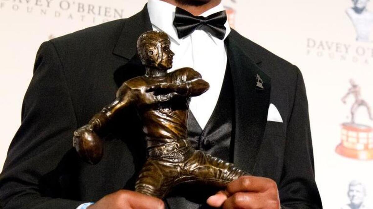Deshaun Watson shows the National Quarterback Award trophy he received at the annual Davey O’Brien award ceremony in Fort Worth, Texas, Monday, Feb. 20, 2017. Watson was presented his second consecutive Davey O’Brien Award as the nation's top quarterback.