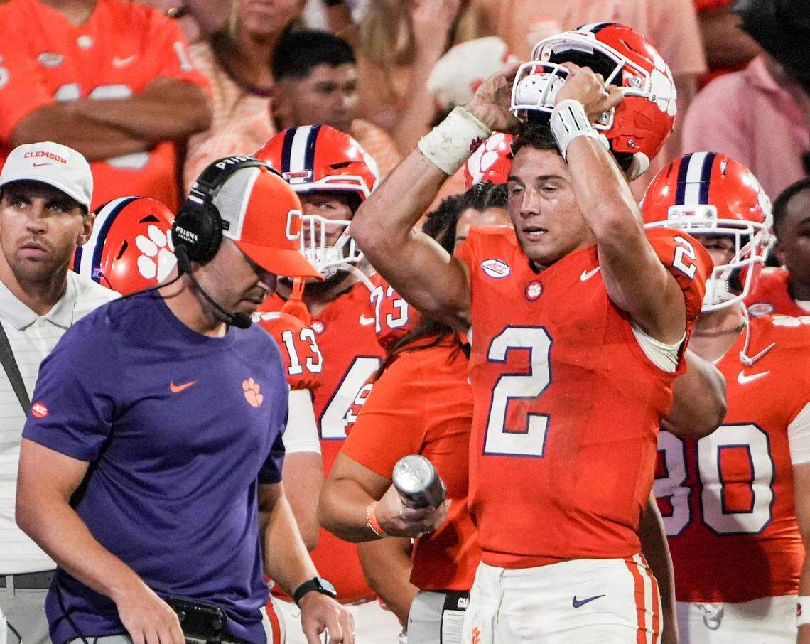Clemson quarterback Cade Klubnik (2) reacts near offensive coordinator Garrett Riley after LSU beat Clemson 17-10 at Memorial Stadium in Clemson, S.C. Saturday, August 30, 2025.