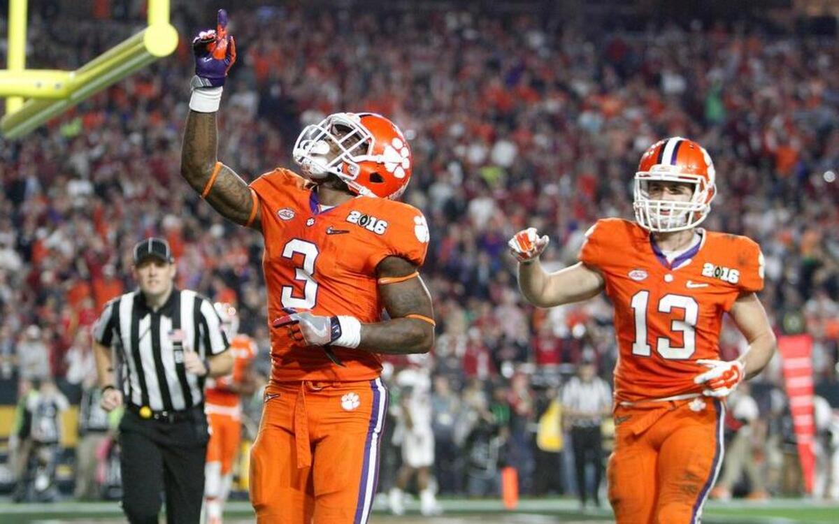 Clemson Tigers wide receiver Artavis Scott (3) and Hunter Renfrow (13) react a after a touchdown in last season’s national championship game.