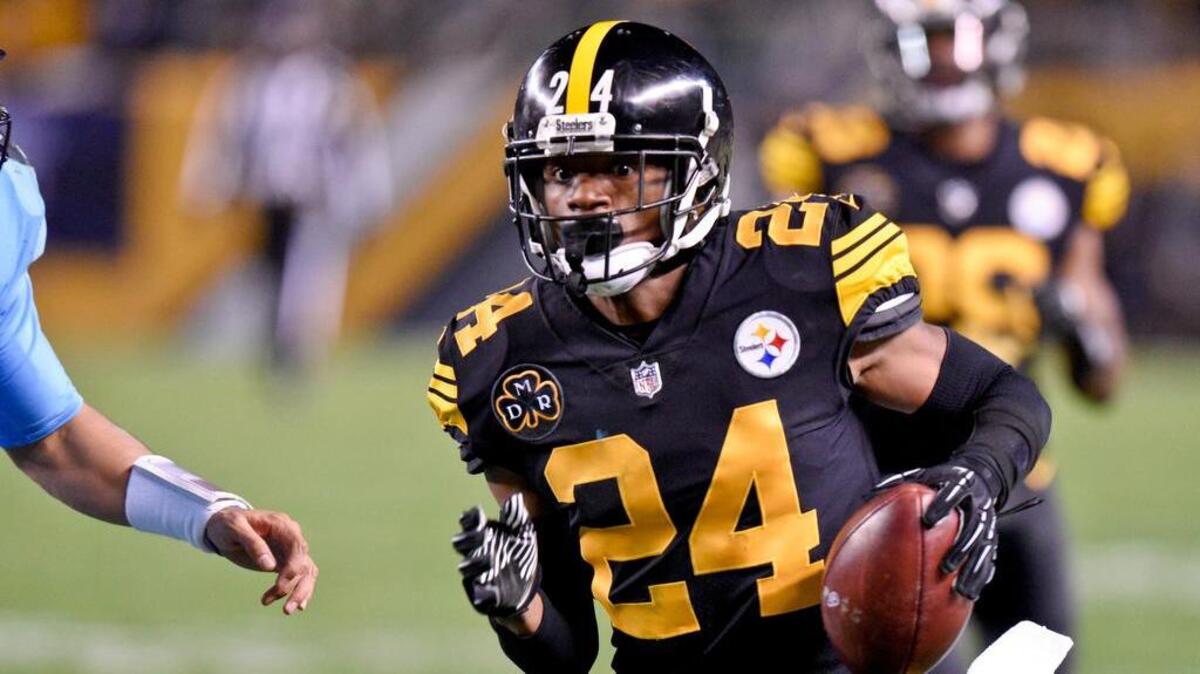 Pittsburgh Steelers defensive back Coty Sensabaugh (24) runs with the ball after making an interception against the Tennessee Titans during an NFL football game in Pittsburgh, Thursday, Nov. 16, 2017, in Pittsburgh.
