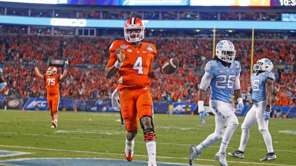 Clemson quarterback Deshaun Watson runs for a touchdown in the first half of the ACC Championship game Saturday night.
