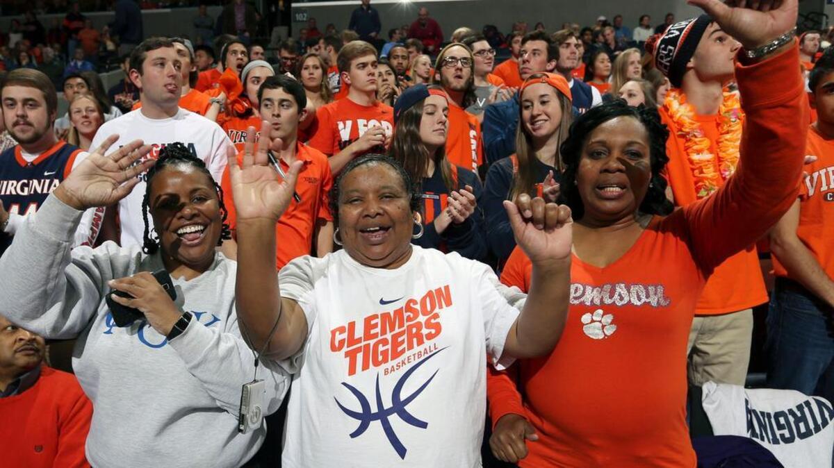 Clemson fans cheer during an NCAA college basketball game game against Virginia Tuesday Jan. 19, 2016, in Charlottesville, Va.