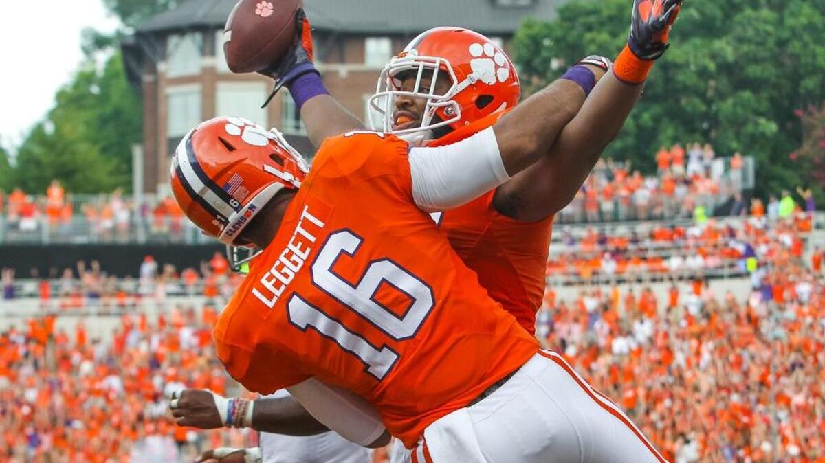 Clemson defensive lineman Christian Wilkins celebrates his touchdown catch against Troy.