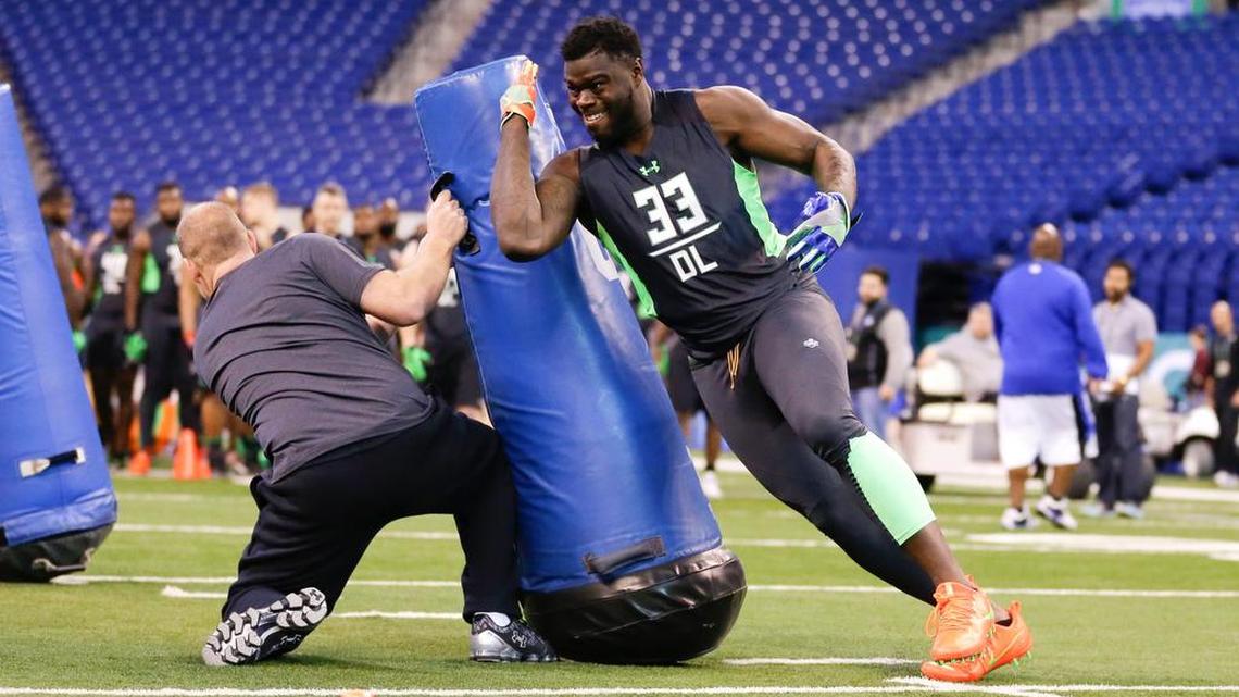 Clemson defensive lineman Shaq Lawson runs a drill at the NFL football scouting combine in Indianapolis, Sunday, Feb. 28, 2016. (AP Photo/Michael Conroy)