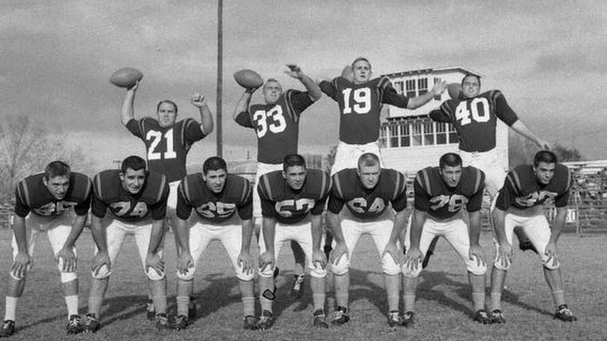 The 1958 Clemson Sugar Bowl team's starting offensive unit mugged for photos during a practice session at Biloxi High School in Biloxi, Mississippi, leading up the game.