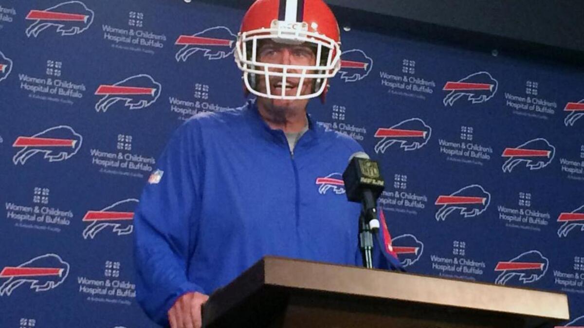 Buffalo Bills head football coach Rex Ryan wears a Clemson college football helmet during a news conference in Orchard Park, N.Y., Tuesday. Ryan has a connection to the No. 1 ranked Tigers. His son, Seth, plays receiver for Clemson. And Rex Ryan plans to attend the Tigers’ game at Syracuse on Saturday.