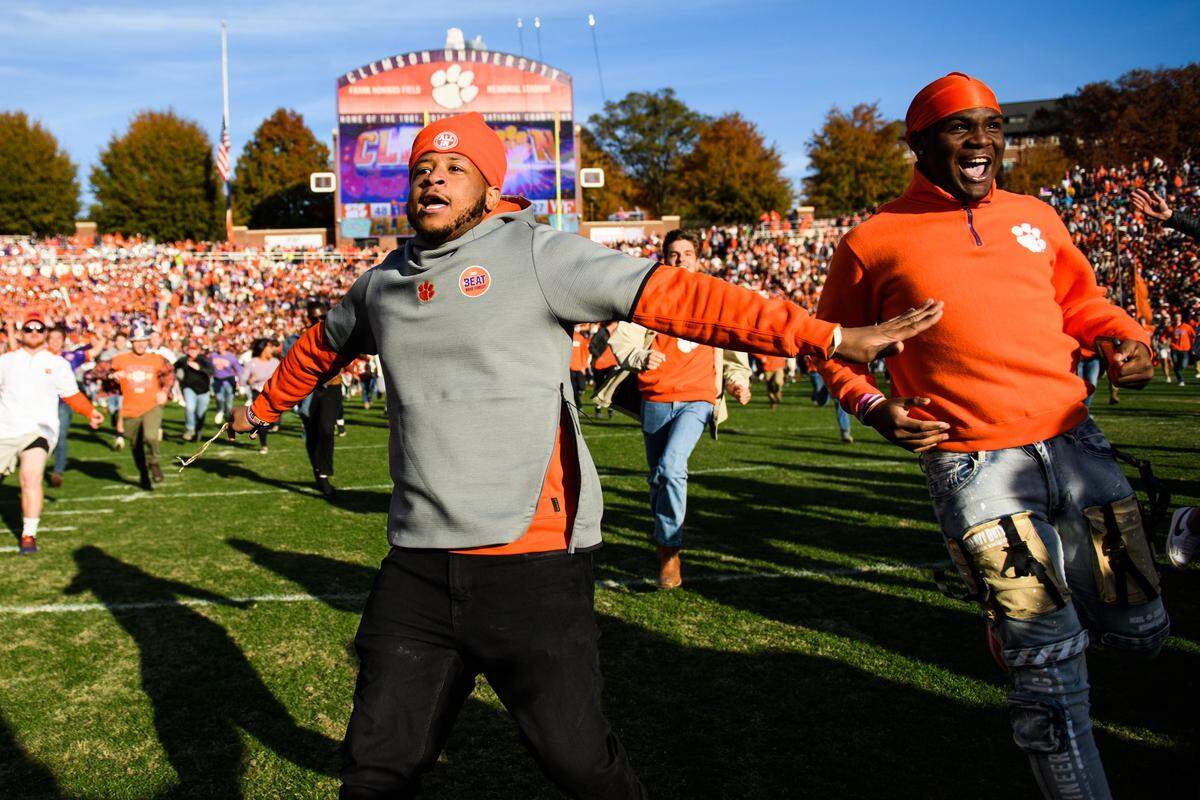 Clemson fans rush onto the field after their 48-27 victory against Wake Forest at Memorial Stadium on Nov. 20 2021. 