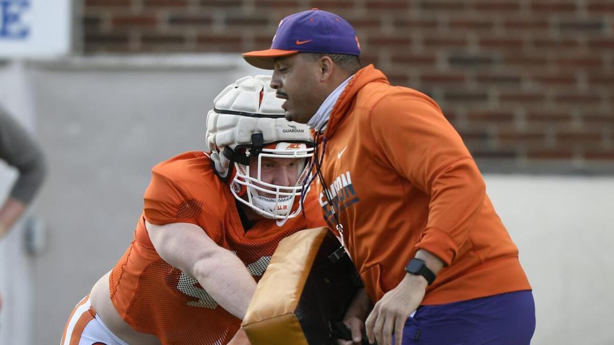 Clemson offensive coordinator Tony Elliott works with tight end Will Blackston (43) during the Tiger’s spring practice Friday, March 5, 2021. Bart Boatwright/Special to The State