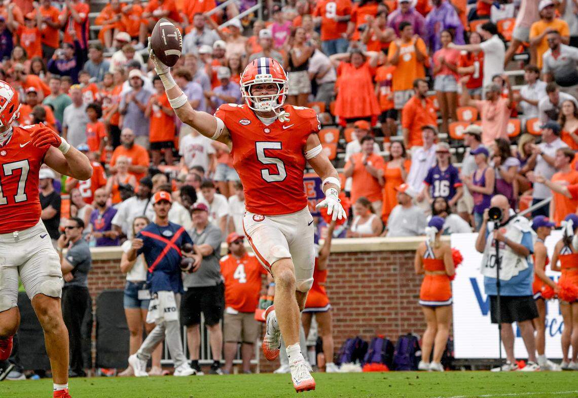 Clemson defensive back Ronan Hanafin (5) intercepts a ball against Troy during the third quarter at Memorial Stadium in Clemson, S.C. Saturday, September 6, 2025.