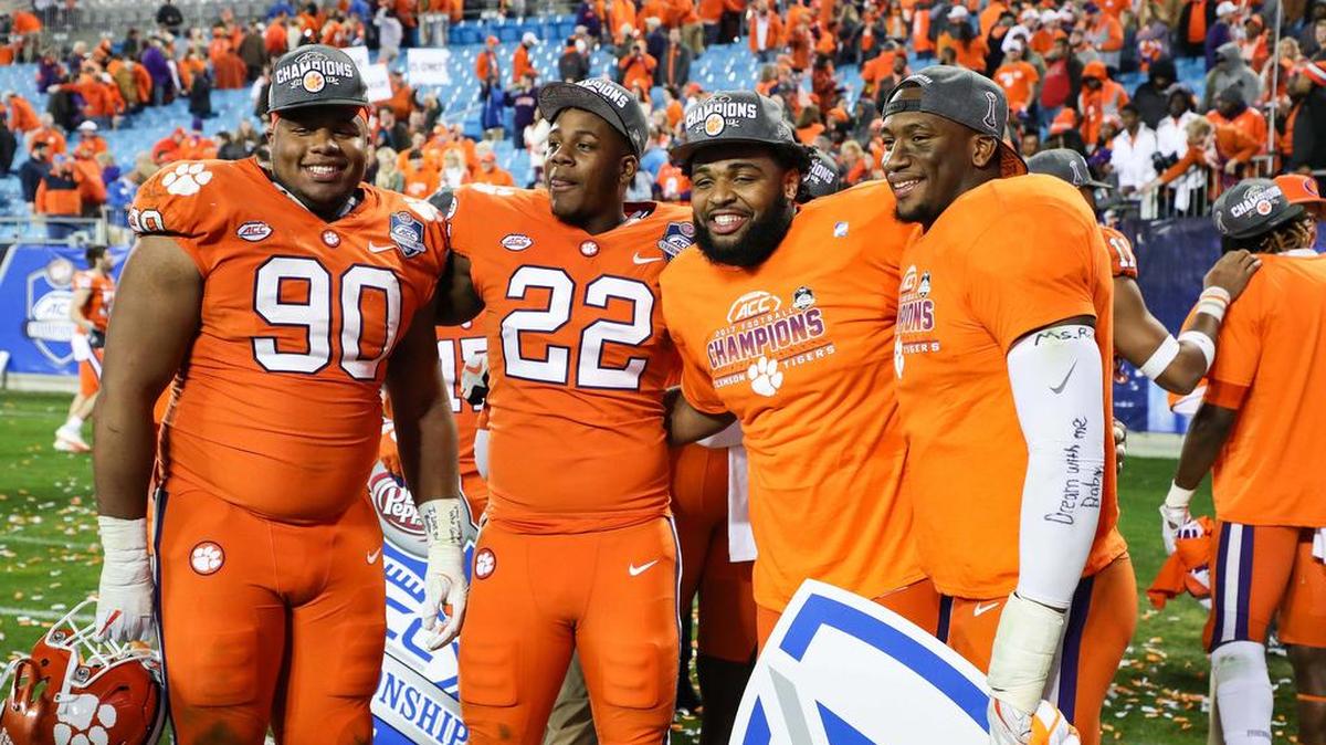 From left to right, Clemson defensive linemen Dexter Lawrence, Xavier Kelly, Christian Wilkins and Clelin Ferrell celebrate after the Tigers won the ACC title in December.