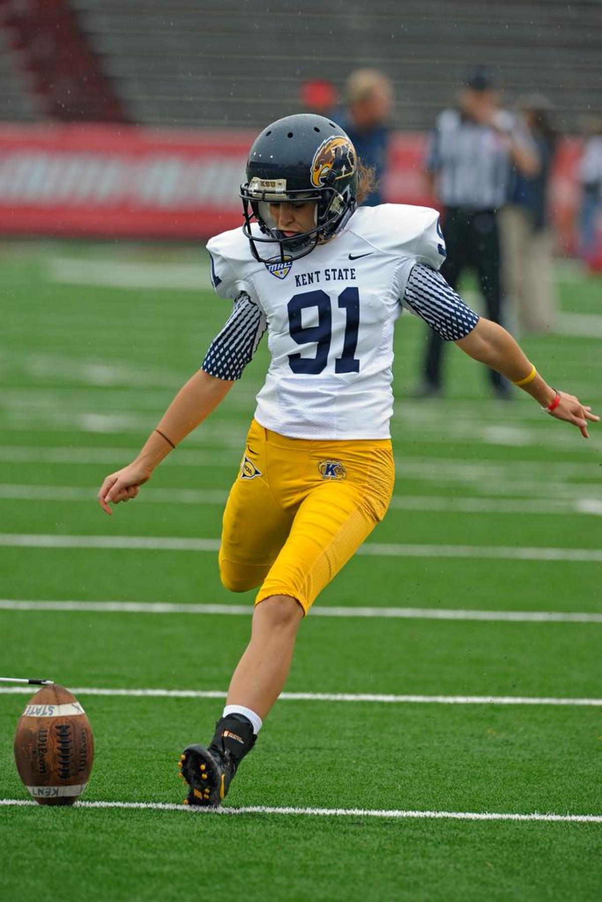 Kent State kicker April Goss (91) kicks during warmups before taking on South Alabama in an NCAA college football game in Mobile, Ala., in 2013. She is now a grad student at Clemson.