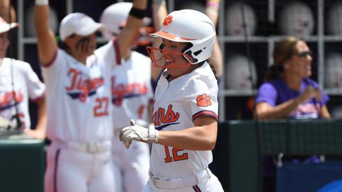 Clemson second baseman Cammy Pereira (12) scores against Louisiana during the Clemson Regional Sunday at Clemson’s McWhorter Stadium.