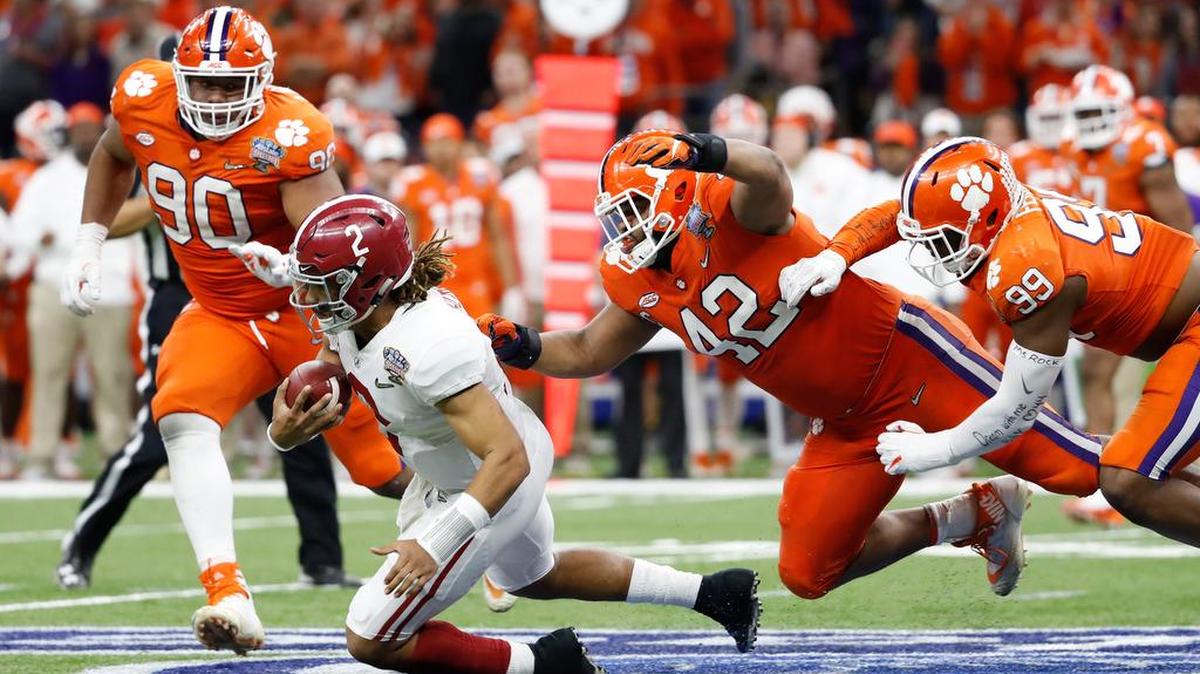 Clemson defensive linemen Christian Wilkins (42) and Clelin Ferrell (99) opted to return to school instead of entering the NFL draft.