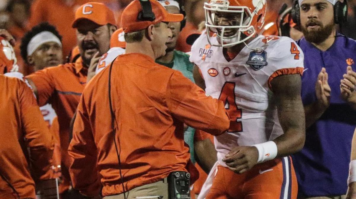 Deshaun Watson celebrates with coach Dabo Swinney when the Tigers took on the Virginia Tech Hokies in the 2016 ACC Championship Game.