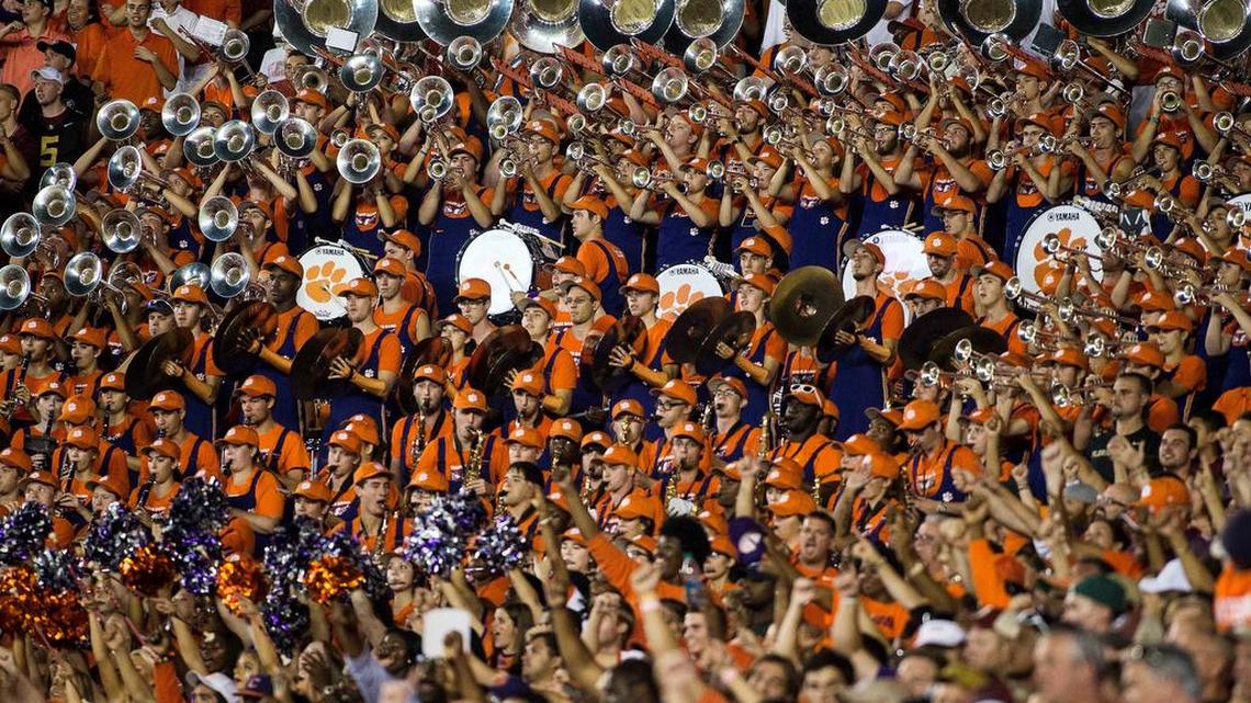 Members of the Clemson Tigers band perform at Doak Campbell Stadium.