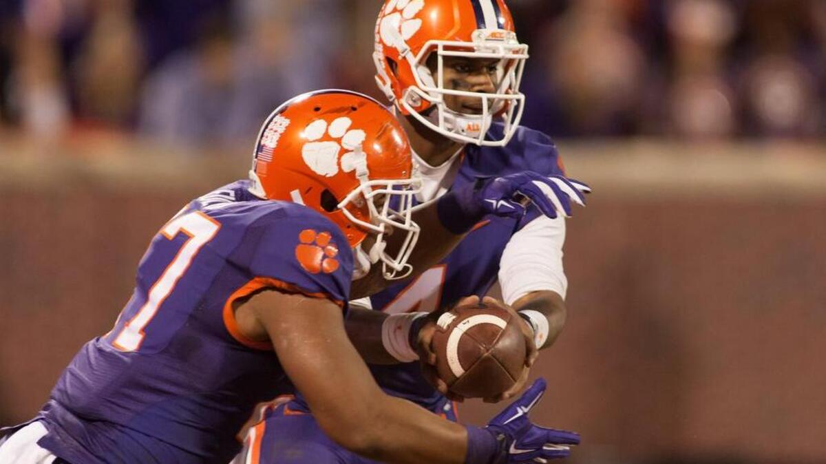 Clemson Tigers quarterback Deshaun Watson (4) and running back C.J. Fuller (27)
