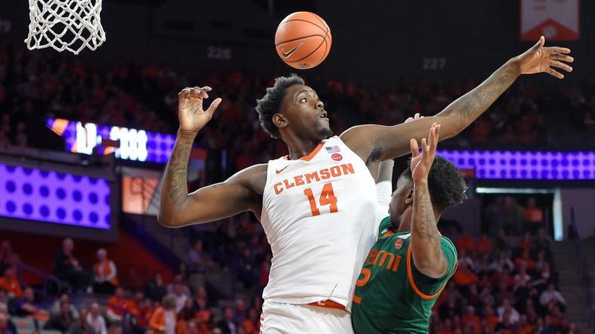 Clemson's Elijah Thomas blocks a shot attempt by Chris Lykes during the game Saturday, Jan. 13, 2018, in Clemson.