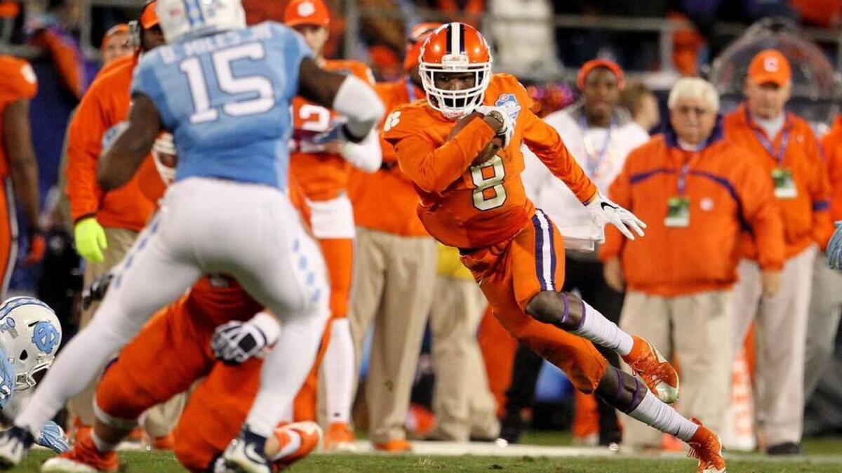 Clemson Tigers wide receiver Deon Cain (8) looks for room to run after a catch in the second half of the ACC Championship game against North Carolina at Bank of America Stadium in Charlotte, NC.