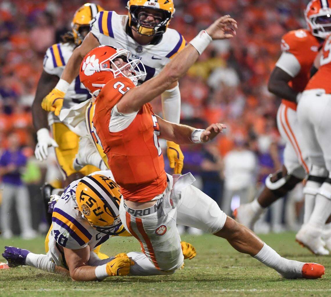 LSU Tigers linebacker Whit Weeks (40) pressures Clemson Tigers quarterback Cade Klubnik (2) Saturday, Aug. 30, 2025 during the NCAA football game at Memorial Stadium in Clemson, South Carolina. LSU Tigers won 17-10.