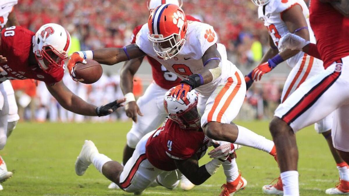Clemson running back Wayne Gallman scores on a 3-yard touchdown run during the second half against North Carolina State on Saturday.